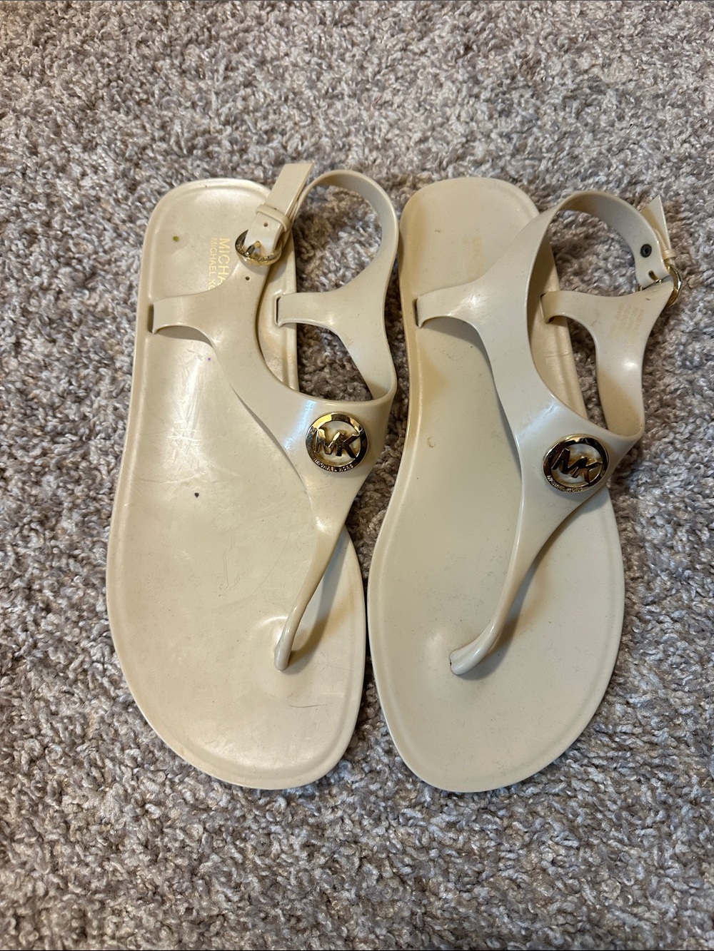 MICHAEL Michael Kors Cream Jelly Thong Sandals with Gold MK Medallion